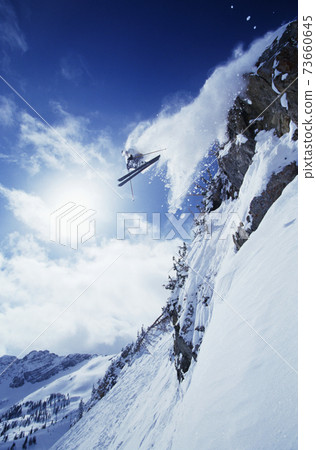 Skier Jumping From Mountain 73660645