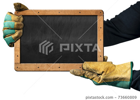 Hands with Protective Work Gloves Holding an Empty Blackboard Hands with Protective Work Gloves Holding an Empty Blackboard 73660809