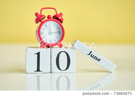 10 tenth june Month Calendar Concept on Wooden Blocks. 73660873