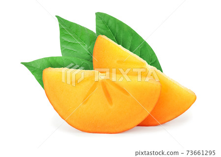 slice of Persimmon fruit with leaves isolated on white background close-up slice of Persimmon fruit with leaves isolated on white background close-up 73661295
