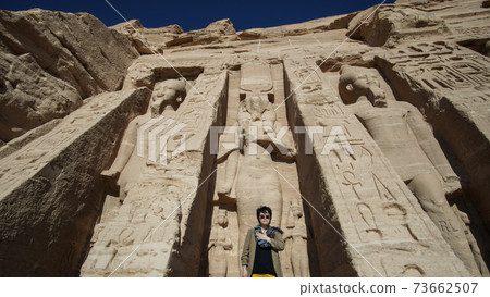 Happy Asian tourist woman travel to Egypt Abu Simbel internation historic handmark 73662507