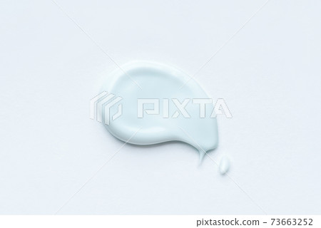 Smear of cosmetic clay on a white background. 73663252