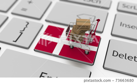 Goods made in Denmark in the shopping cart on the keyboard. Export or import concepts, 3d rendering Goods made in Denmark in the shopping cart on the keyboard. Export or import concepts, 3d rendering 73663680