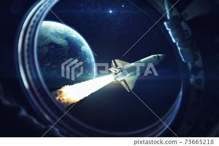 Space shuttle orbiting Earth planet. Elements of this image furnished by NASA 73665218