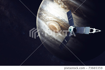 Juno spacecraft and Jupiter. Elements of this image furnished by NASA Juno spacecraft and Jupiter. Elements of this image furnished by NASA 73665359