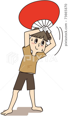 A young man who heats up with a big fan in a sauna A young man who heats up with a big fan in a sauna 73665870