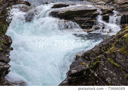small river in mountains, Norway 73666089