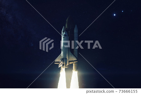 Space shuttle orbiting Earth planet. Elements of this image furnished by NASA 73666155