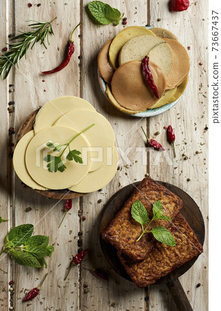 vegan cheese, tofu fillets and tofu cold cuts 73667437