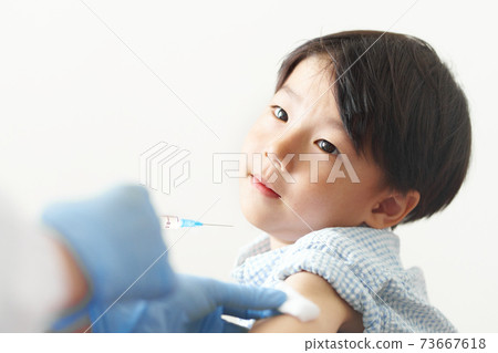 Vaccinated boy Vaccinated boy 73667618