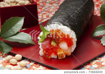 Blessed Ehomaki with plenty of seafood ingredients Blessed Ehomaki with plenty of seafood ingredients 73668849