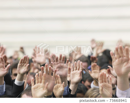 Business Crowd Raising Hands Business Crowd Raising Hands 73668941