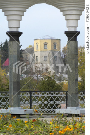 View of Ksido palace through fragment of collonade View of Ksido palace through fragment of collonade 73669428