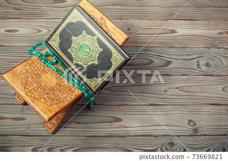 The holy book of the Koran on the stand The holy book of the Koran on the stand 73669821