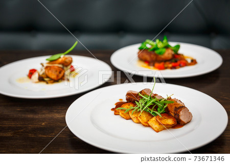 three different dishes of chicken, beef and pork three different dishes of chicken, beef and pork 73671346