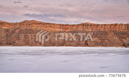 Calm dusk over Colorado foothills 73673676