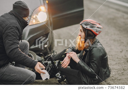 Road accident with cyclist man driver and car Road accident with cyclist man driver and car 73674382