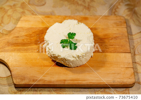 Homemade cheese made from natural milk 73675410