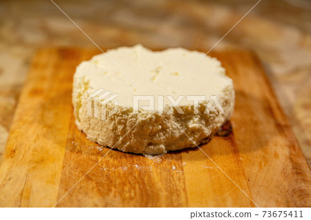 Homemade cheese made from natural milk 73675411
