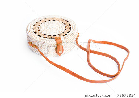Handbag from Ratan on a white background. Bali style Handbag from Ratan on a white background. Bali style 73675834