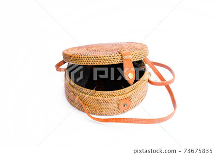 Handbag from Ratan on a white background. Bali style Handbag from Ratan on a white background. Bali style 73675835