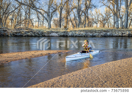 canoe paddling on South Platte RIver canoe paddling on South Platte RIver 73675898