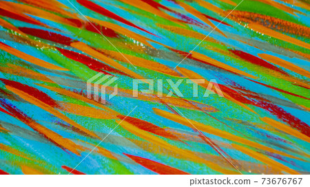Bright varied background of colored lines of brush strokes made with paint 73676767