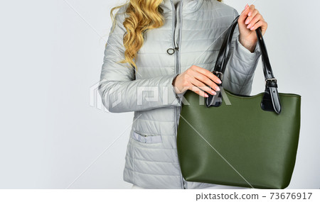 your purse should look good. woman wear fall jacket. your purse should look good. woman wear fall jacket. 73676917