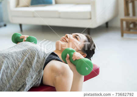 Young women home training muscle training 73682792