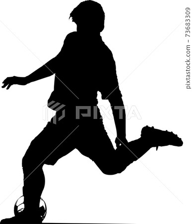 Silhouette of a soccer player kicking 73683309