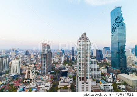 Modern office buillding and condominium sunset sky Modern office buillding and condominium sunset sky 73684021
