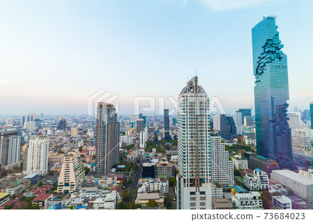 Modern office buillding and condominium sunset sky Modern office buillding and condominium sunset sky 73684023