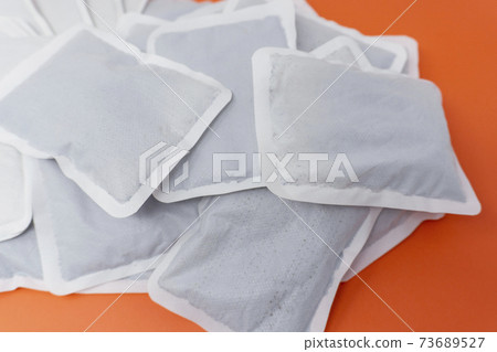 Used disposable body warmers 73689527