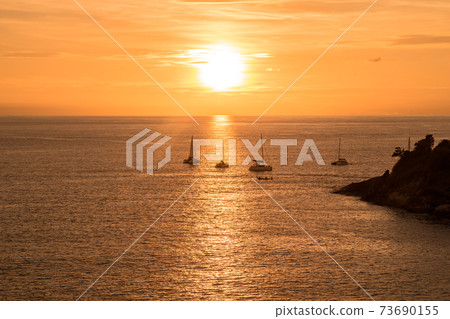 Silhouette yacht. Boat on the andaman sea at sunset in Phuket, Thailand Silhouette yacht. Boat on the andaman sea at sunset in Phuket, Thailand 73690155