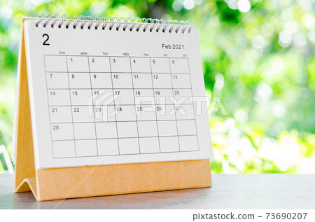 February 2021 Calendar desk for organizer to plan and reminder. 73690207