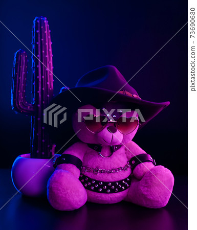 toy bear with heart shaped glasses and a cowboy hat on a leather belt accessory for BDSM games Valentine's Day gift toy bear with heart shaped glasses and a cowboy hat on a leather belt accessory for BDSM games Valentine's Day gift 73690680