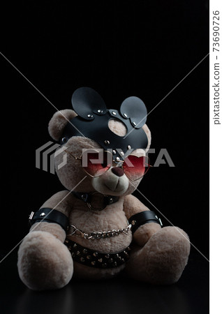toy bear with glasses in the form of a heart in a leather belt accessory for BDSM games gift for Valentine's day toy bear with glasses in the form of a heart in a leather belt accessory for BDSM games gift for Valentine's day 73690726