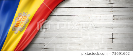 Andorran flag on old white wall banner 73691602