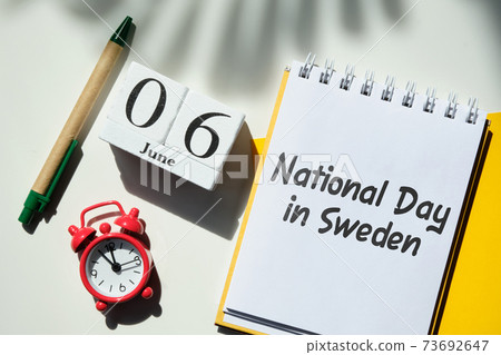 National Day in Sweden 06 sixth june Month Calendar Concept on Wooden Blocks. 73692647