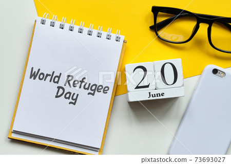 World Refugee Day 20 twentieth june Month Calendar Concept on Wooden Blocks. World Refugee Day 20 twentieth june Month Calendar Concept on Wooden Blocks. 73693027