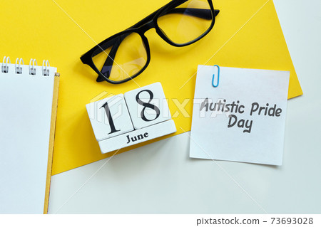 Autistic Pride Day 18 eighteenth june Month Calendar Concept on Wooden Blocks. Autistic Pride Day 18 eighteenth june Month Calendar Concept on Wooden Blocks. 73693028