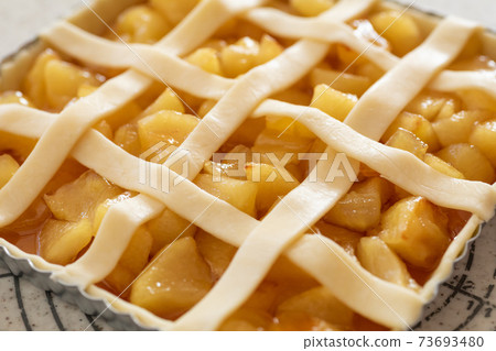 Making sweets at home Apple pie before baking in the oven 73693480