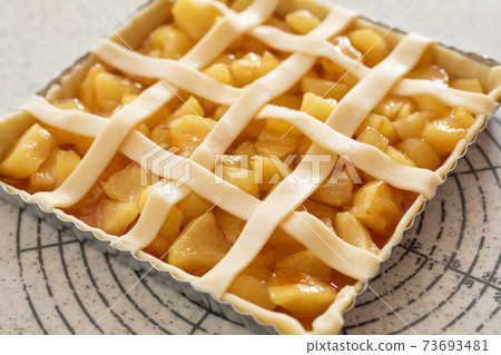 Making sweets at home Apple pie before baking in the oven 73693481
