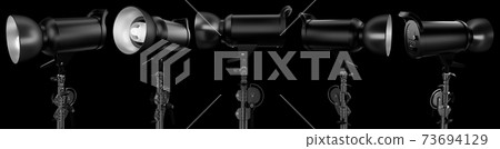 Photography studio flash on a lighting stand isolated on black background. 73694129