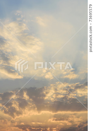 Beautiful sky and clouds with sunlight before sunset Beautiful sky and clouds with sunlight before sunset 73695579