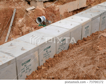 SELANGOR, MALAYSIA -JANUARY 19, 2020: Underground precast concrete box culvert drain under construction at the construction site. It is used to channel stormwater to the nearest monsoon drain.  73700172