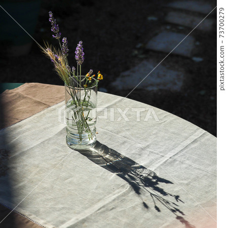 Wildflowers in the glass 73700279