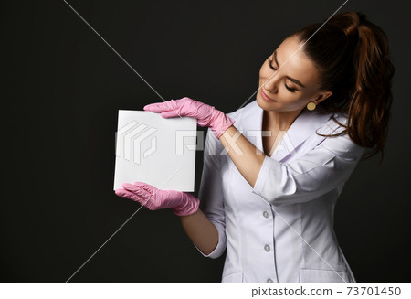 Young smiling pretty woman doctor therapist in Young smiling pretty woman doctor therapist in 73701450