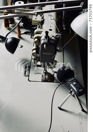 Industrial sewing machine photography Industrial sewing machine photography 73703749