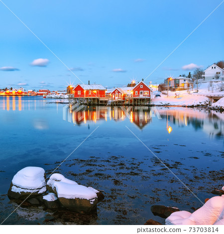 Dramatic evening cityscape of Reine town Dramatic evening cityscape of Reine town 73703814